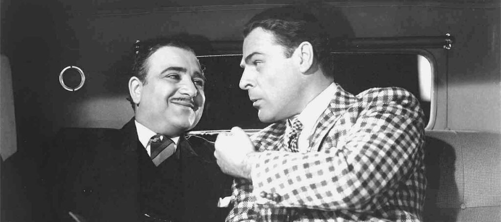 ‘The Boss’ (Akim Tamiroff) is more amused than frightened of either Dan McGinty’s (Brian Donlevy) bad sense of fashion or his big, meaty fist, in the Academy Award winning The Great McGinty (1940).