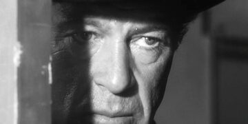 Realistic, principled and most of all, resolute, Sheriff Kane (Gary Cooper) waits to face his own high noon. High Noon.