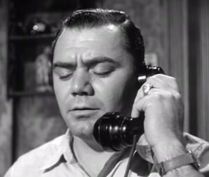 Calling for a date, Marty (Ernest Borgnine) closes his eyes, a vain effort to once again try and block out the pain of rejection.